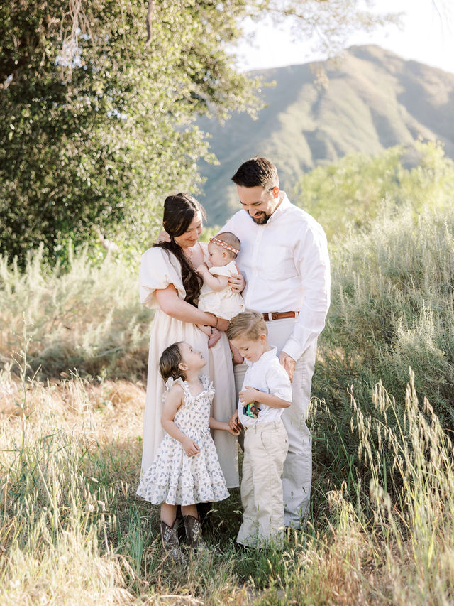 Family of five together during an outdoor family photo session in Santa Clarita