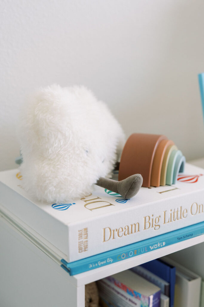 Neutral rainbow nursery decor photographed during a Santa Clarita newborn session at home.