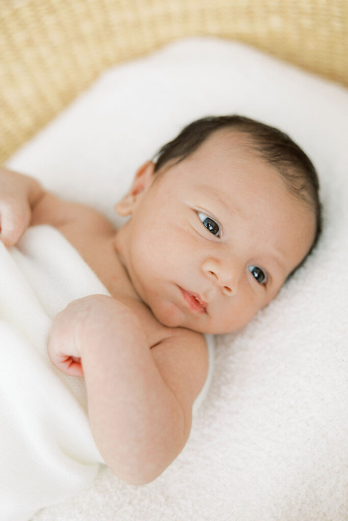 Close up newborn portrait highlighting baby’s sweet features