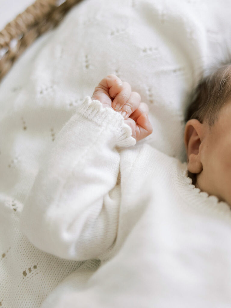 Close up of a newborn baby’s tiny hand during a Santa Clarita newborn photography session