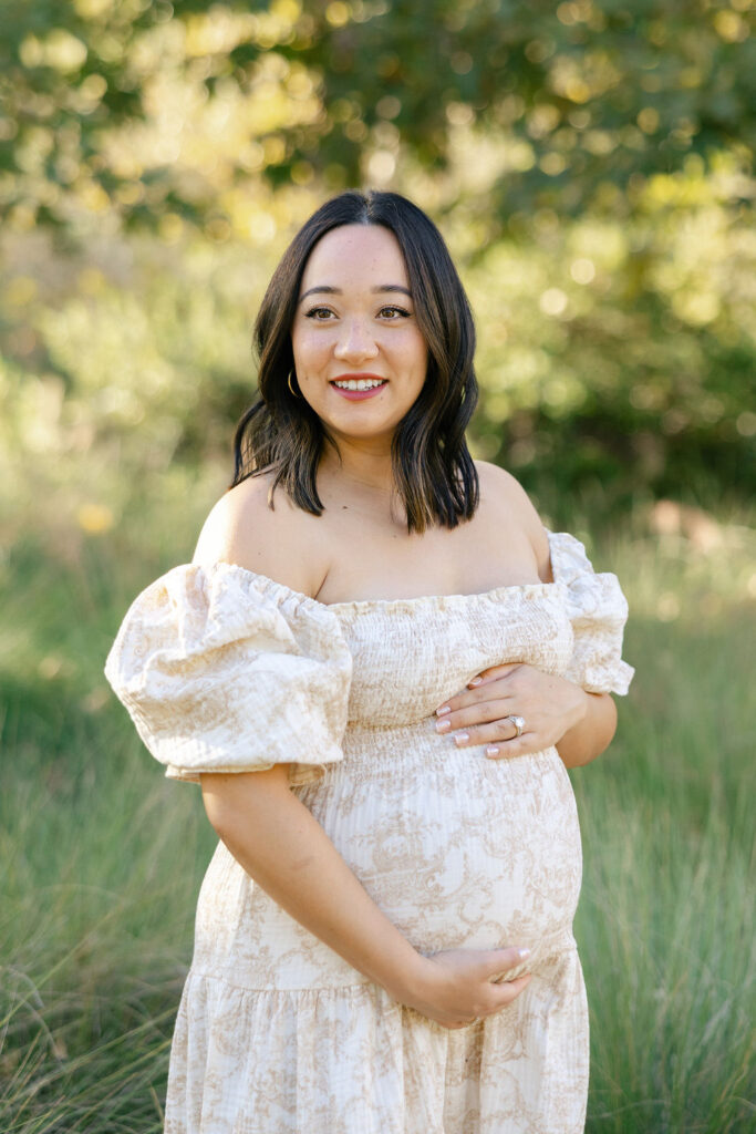 Pregnant woman posing in soft evening light during a Santa Clarita maternity photography session