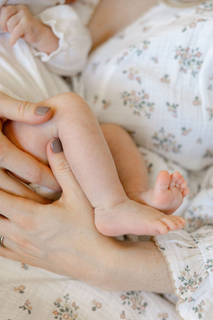 Newborn detail photo with tiny hands during an in home newborn photography session